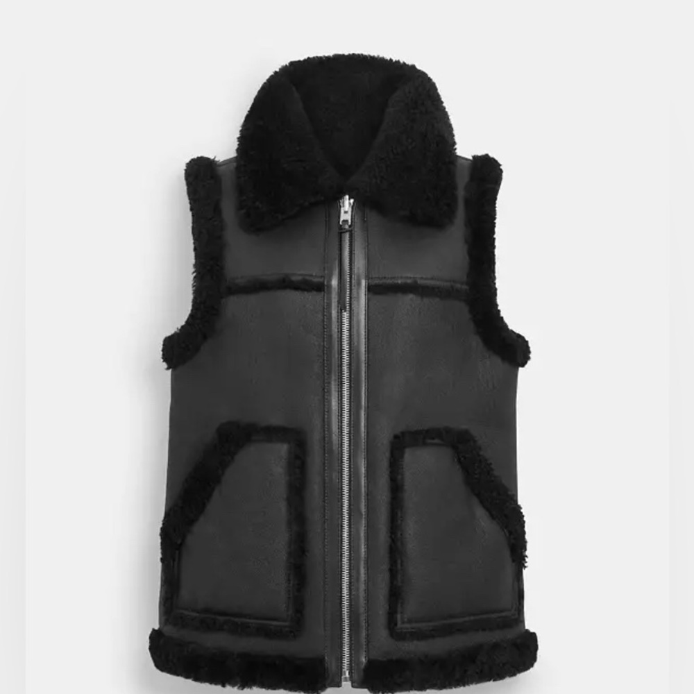 Reversible, Black Shearling Coach Vest with Coach garment bag